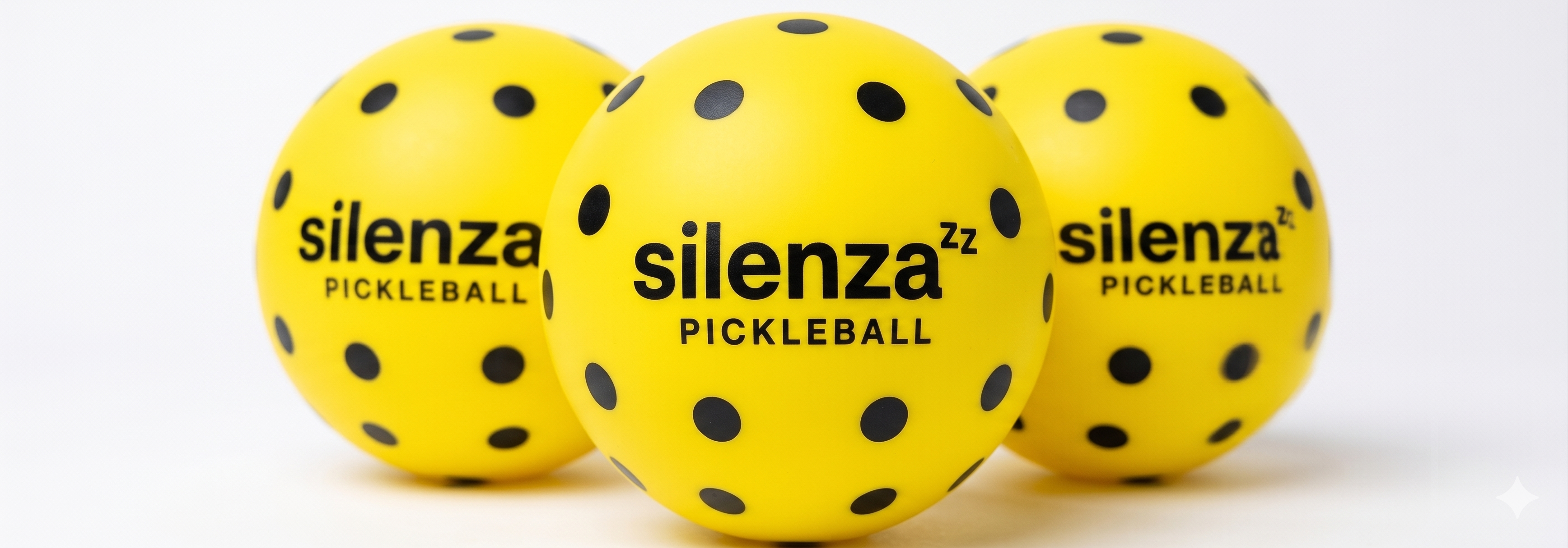 SILENZA Pickleball — Optical yellow, black perforation pattern visual emulation, solid PU Foam core